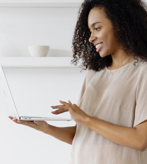 Woman holding laptop